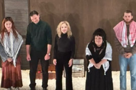 Harry Greenwood (right) and Megan Wilding (middle) wearing keffiyeh in the STC’s production of The Seagull.