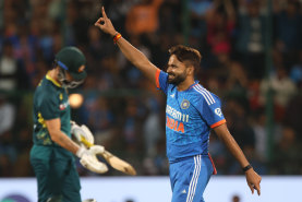 Mukesh Kumar celebrates after bowling out Matt Short. 