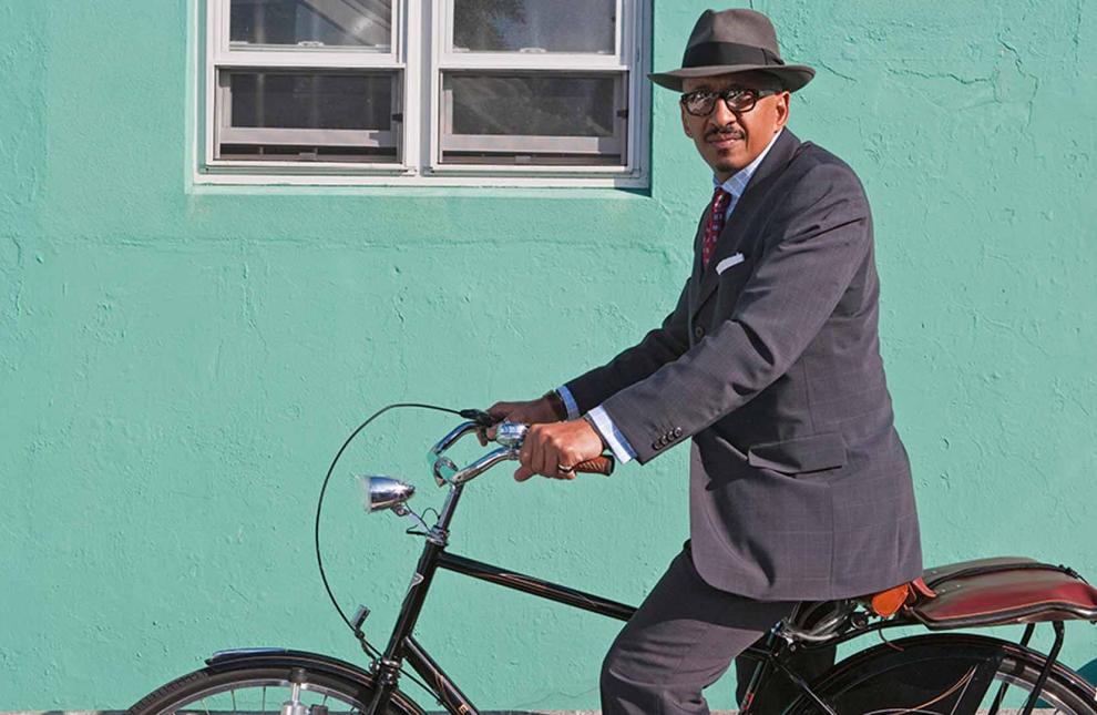 An office worker rides his bicycle in Hamilton. GAVIN HELLIER/ALAMY VIA SHUTTERSTOCK