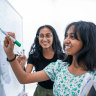 Sisters Amara (front) and Sahana have been taking additional classes for years to build their skills in areas such as English, maths and science. 