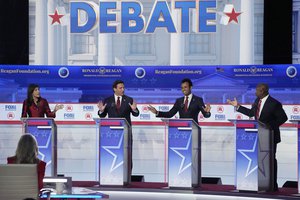 From left to right, former U.N. Ambassador Nikki Haley, Florida Gov. Ron DeSantis, businessman Vivek Ramaswamy and Sen. Tim Scott, R-S.C., argue a point during a Republican presidential primary debate hosted by FOX Business Network and Univision, Wednesday, Sept. 27, 2023, at the Ronald Reagan Presidential Library in Simi Valley, Calif.