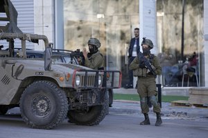 Israeli soldiers operate in village of Sarra near the Palestinians West Bank city of Nablus, Sunday, March 12, 2023