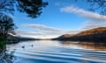 Canoeing across Coniston Water in the Lake District national park