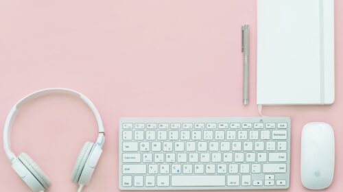 White gear on pink flatlay