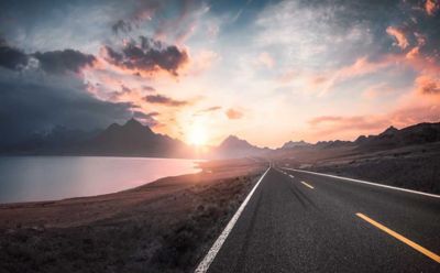 sunset clouds and open road