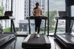 On the treadmill at the hotel gym.