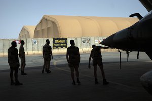 French Barkhane Air Force mechanics maintain a Mirage 2000 on the Niamey, Niger base