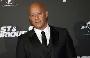 FILE - Vin Diesel poses during the premiere of Fast and Furious 8, in Paris, April 5, 2017.  The actor has been accused by his former assistant of sexual battery while working for him in 2010. Astra Jonasson filed a lawsuit in Los Angeles on Thursday, Dec. 21, 2023, alleging that Diesel forced himself onto her in a hotel suite in Atlanta.(AP Photo/Thibault Camus, File)