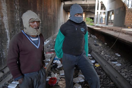 Scrap metal collector Letta (left) with a companion at the ransacked Jeppe station: "The police don’t care. They don’t protect anything."