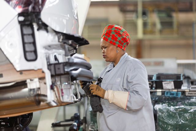 A worker in the assembly hall of the South African VW factory