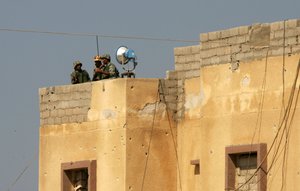 A Egyptian security stands guard near smuggling tunnels along the Gaza-Egypt border in Rafah in the southern Gaza Strip