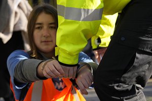 File - Police arrests protesters of the climate campaigners group Just Stop Oil in London, Thursday, Nov. 23, 2023. Britain is one of the world's oldest democracies, but some worry that essential rights and freedoms are under threat. They point to restrictions on protest imposed by the Conservative government that have seen environmental activists jailed for peaceful but disruptive actions.