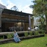 Sandy Thomas in her Pearl Beach home which is for sale.