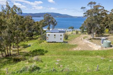 tiny home and portaloo are extras at coastal tasmanian property for sale domain 