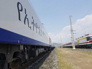 Locomotives for the new Ethiopia to Djibouti electric railway system queue outside a train station in the outskirts of Addis Ababa