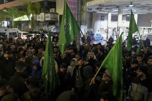 Palestinian demonstrators wave Hamas flags and shout slogans during a protest following the killing of top Hamas official Saleh Arouri in Beirut, in the West Bank city of Nablus on Tuesday, Jan. 2, 2024. Arouri, the No. 2 figure in Hamas, was killed in an explosion blamed on Israel. He is the highest-ranked Hamas figure to be killed in the nearly three-month war between Israel and Hamas.