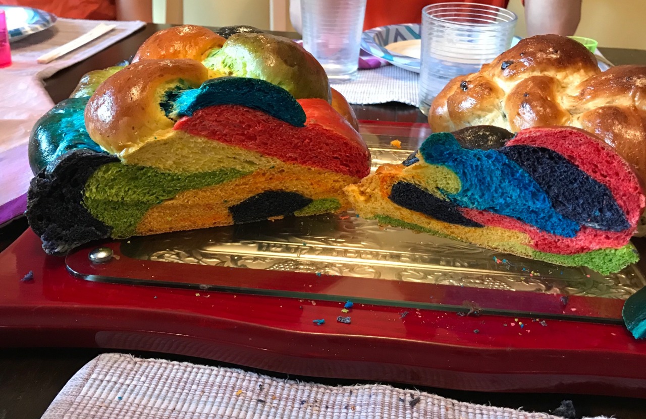 A colorful challah cut in half