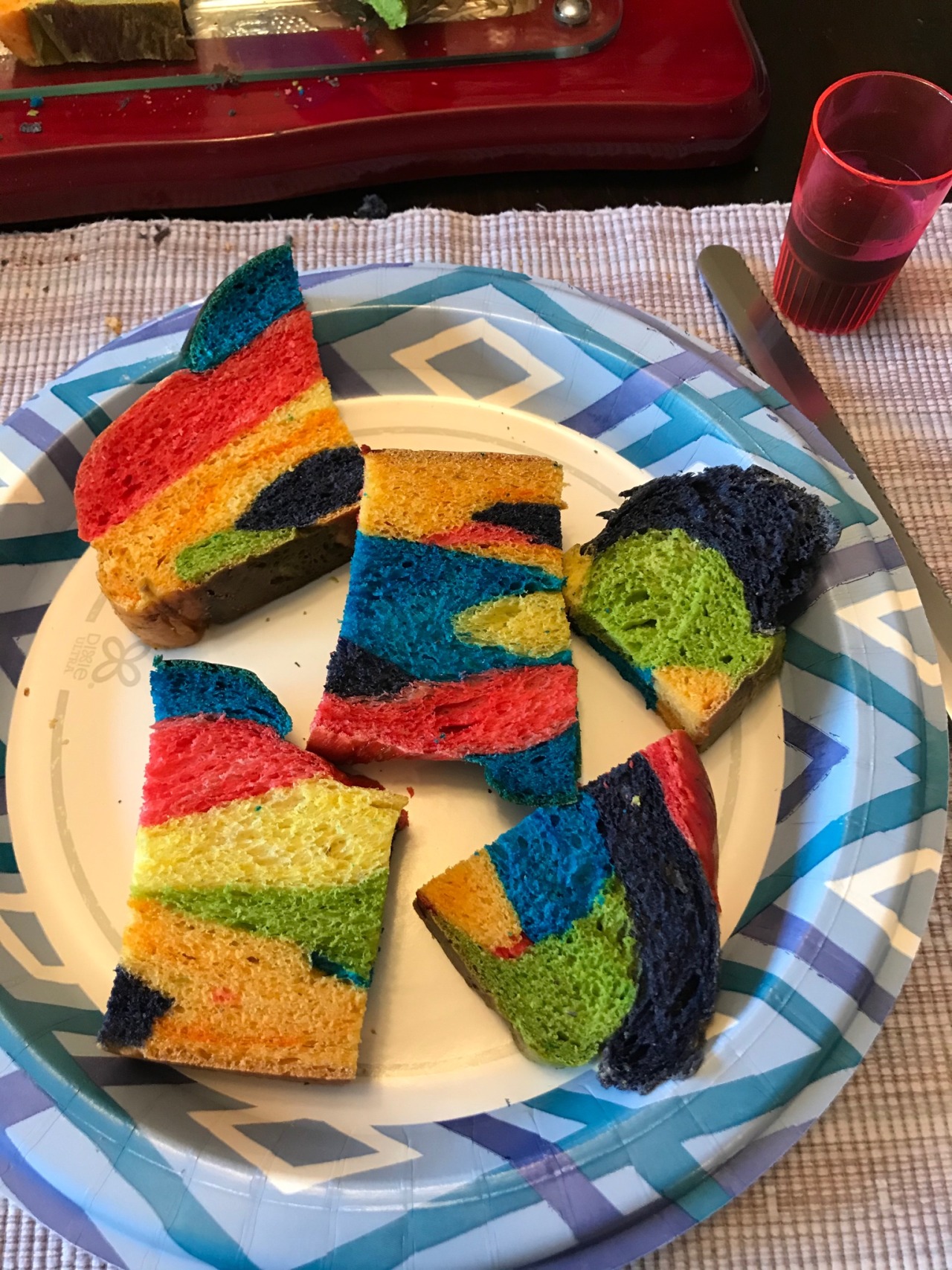 A colorful challah cut into pieces