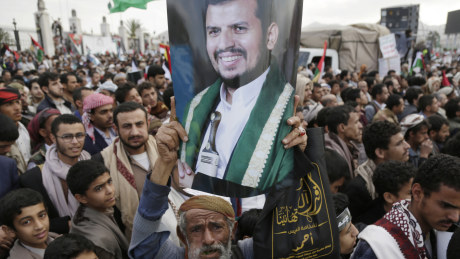 A Yemeni demonstrator lifts a placard depicting the leader of the Houthi movement, Abdul-Malik Badreddin al-Houthi, in Yemen last month.