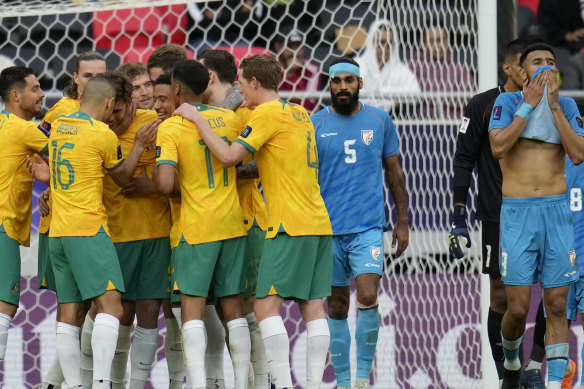 Jordy Bos and the Socceroos celebrate his goal.