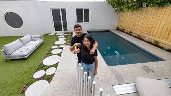 Sonia De Gregorio and husband Ricardo by their new pool that was recently installed. Pools are the number one search term for buyers looking for a home and while spending on pools was down year-on-year after a cost of living squeeze, some are still finding ways to splash out on it. 