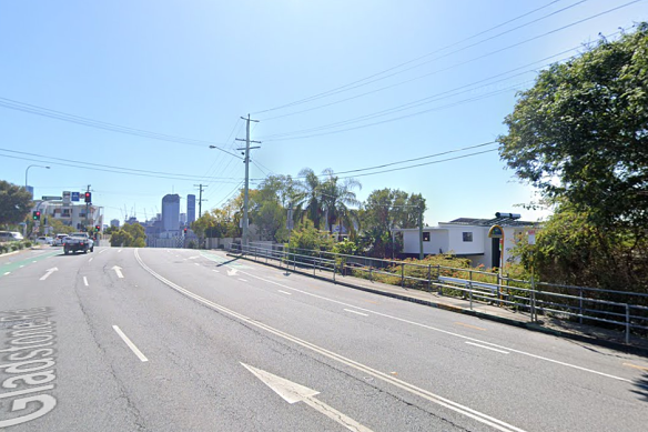 A car and e-scooter crashed on Gladstone Road at Highgate Hill.