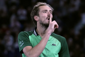 Daniil Medvedev celebrates after defeating Alexander Zverev in their five-set semi-final match at the Australian Open.