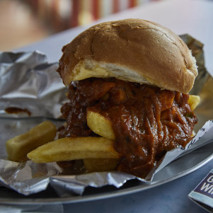 Chip butty with butter chicken gravy.