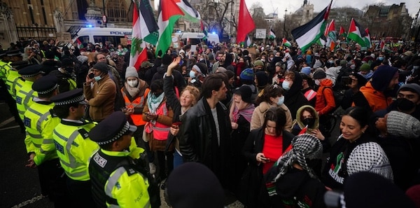 MR Online | Metropolitan Police officers form a cordon at Parliament Square to prevent protesters reaching Westminster Bridge during a Free Palestine Coalition demonstration in central London January 6 2024 | MR Online