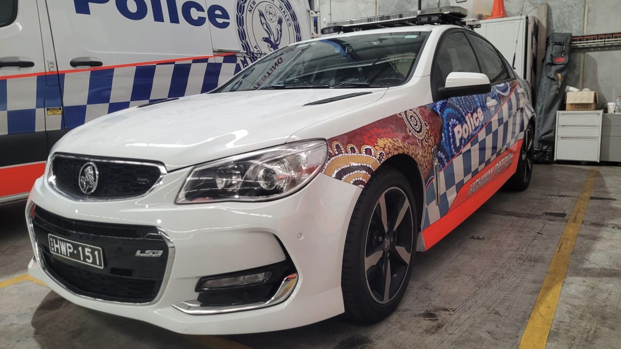 Last Holden Commodore V8 highway patrol sedan in NSW hands in its stripes