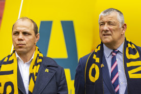 Rugby Australia’s Phil Waugh in 2022 alongside Rugby Victoria president Neil Hay and Reece Hodge, of the Melbourne Rebels.