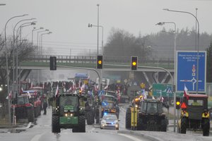 Polish farmers drive tractors in a convoy in Minsk Mazowiecki, Poland, on Tuesday Feb. 20, 2024, as they intensify a nationwide protest against the import of Ukrainian foods and European Union environmental policies. Farmers across Europe have been protesting recently, worried that EU plans to place limits on the use of chemicals and on greenhouse gas emissions will result in a reduction in production and income. They are also in revolt against competition from non-EU countries, in particular Ukraine. (AP Photo/Czarek Sokolowski)