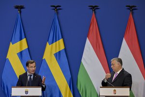 Sweden's Prime Minister Ulf Kristersson, left, speaks during a press conference with his Hungarian counterpart Viktor Orban at the Carmelite Monastery in Budapest, Hungary, Friday, Feb 23, 2024. Nearly two years after Sweden formally applied to join NATO, its membership now hinges on convincing one country - Viktor Orban's Hungary - to formally ratify its bid to join the military alliance.