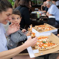 Customers enjoying the Neapolitan-style pizza at Tutto Vero in Oatley.
