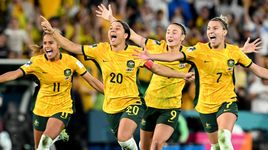 Mary Fowler, Sam Kerr, Caitlin Foord and Steph Catley celebrate their win.