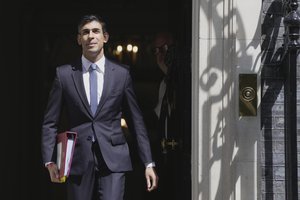 Britain's Prime Minister Rishi Sunak leaves 10 Downing Street to go to the House of Commons for his weekly Prime Minister's Questions in London, Wednesday, May 3, 2023