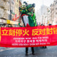 Activists hold up banner reading "Ceasefire now end the siege"