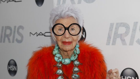 FILE -Iris Apfel attends the premiere of “Iris” at the Paris Theatre on Wednesday, April 22, 2015, in New York. Iris Apfel, a textile expert, interior designer and fashion celebrity known for her eccentric style, has died, Friday, March 1, 2024. She was 102. .(Photo by Andy Kropa/Invision/AP, File)