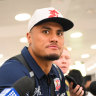 Spencer Leniu arrives at Sydney Airport on Tuesday.