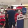 Shoppers injured as display EV car crashes inside Westfield