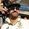 Nathan Lyon takes a selfie with fans at Perth Stadium, which will be awarded the first Test against India despite poor crowds.