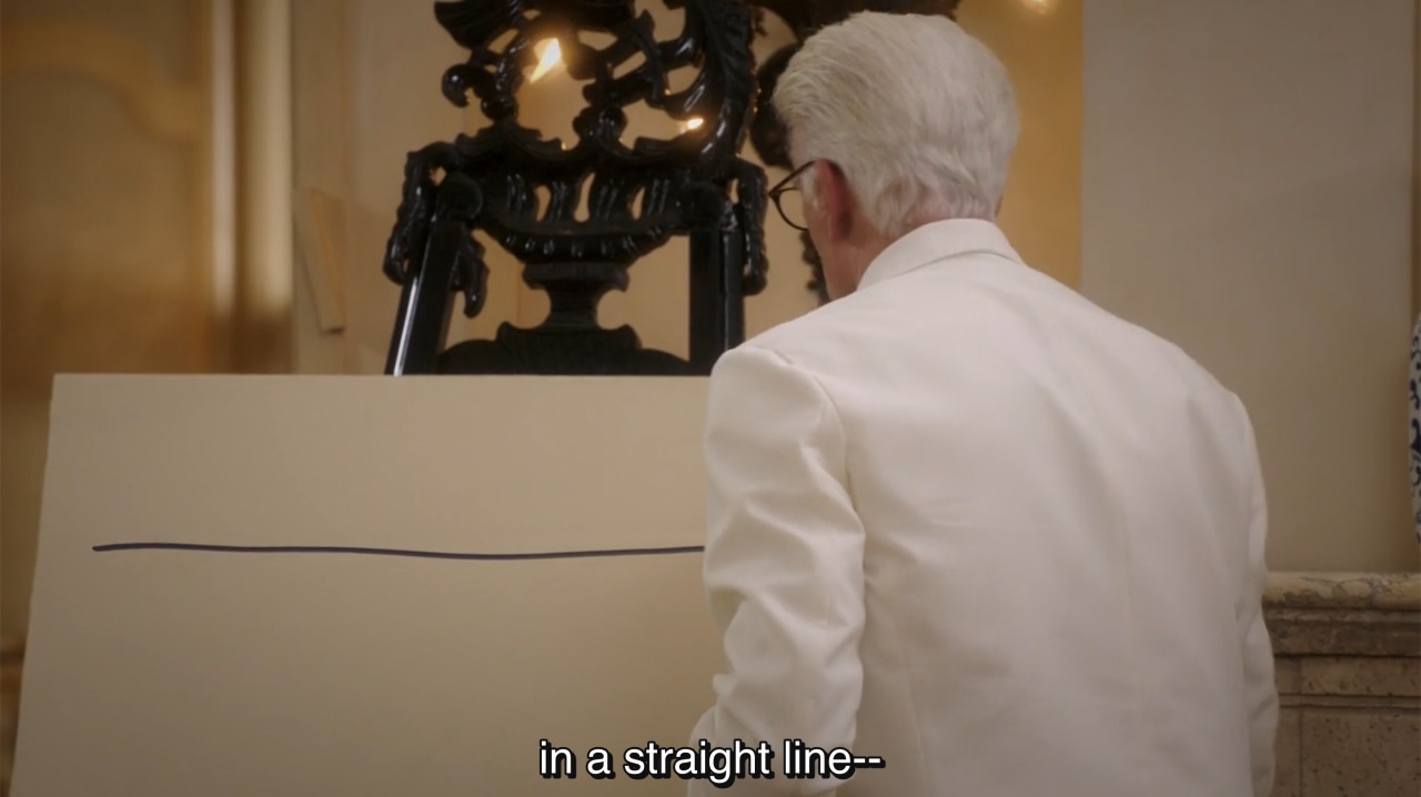 Continued, with Michael drawing on a white board: “in a straight line—”