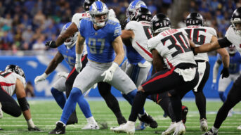 Aidan Hutchinson of the Detroit Lions plays against the Atlanta Falcons. Photo by Getty Images.