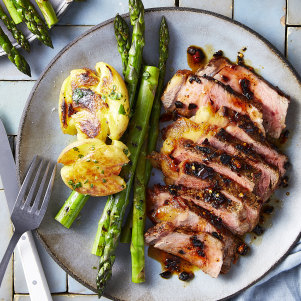 Steak with store-bought crispy chilli oil and simple sides is a midweek favourite.