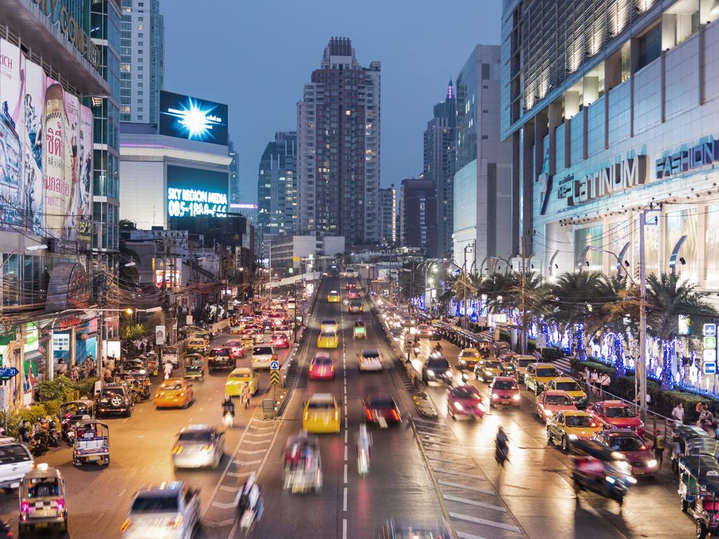 Asia, Thailand, Bangkok, busy road at night, with taxis waiting outside busy shopping complex

credit: Getty Images

escape
doc holiday 
2 january 2022