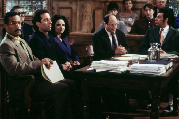 LAB08:SEINFELD:BURBANK,CALIFORNIA,14MAY98 - A scene from the final epsiode of the hit television series "Seinfeld," which was telecast May 14 is shown in this publicity photograph.  Shown in a courtroom scene are (L-R) at table Phil Morris, Jerry Seinfeld, Julia Louis-Dreyfus, Jason Alexander, and Michael Richards.  In gallery (L-R) Estelle Harris, Jerry Stiller, Liz Sheridan and Barney Martin.  fsp/HO-Photo by Joey Del Valle/NBC REUTERS