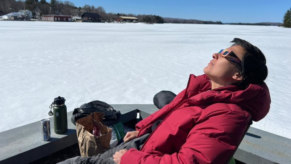 Farrah Tomazin preparing to view the solar eclipse in Greenville, Maine.