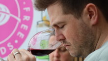 A judge sniffs a red wine at the World Alcohol-Free Awards in London last month.