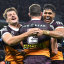 Corey Oates celebrates scoring for the Brisbane Broncos against the Dolphins.