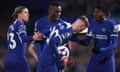 Nicolas Jackson (centre) and Noni Madueke (right) remonstrate with Cole Palmer as he gets set to take the penalty that made it 5-0 to Chelsea